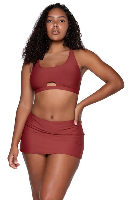 Front view of Sunsets Tuscan Red Brandi Bralette bikini top with Tuscan Red Kokomo Swim Skirt featuring additional model